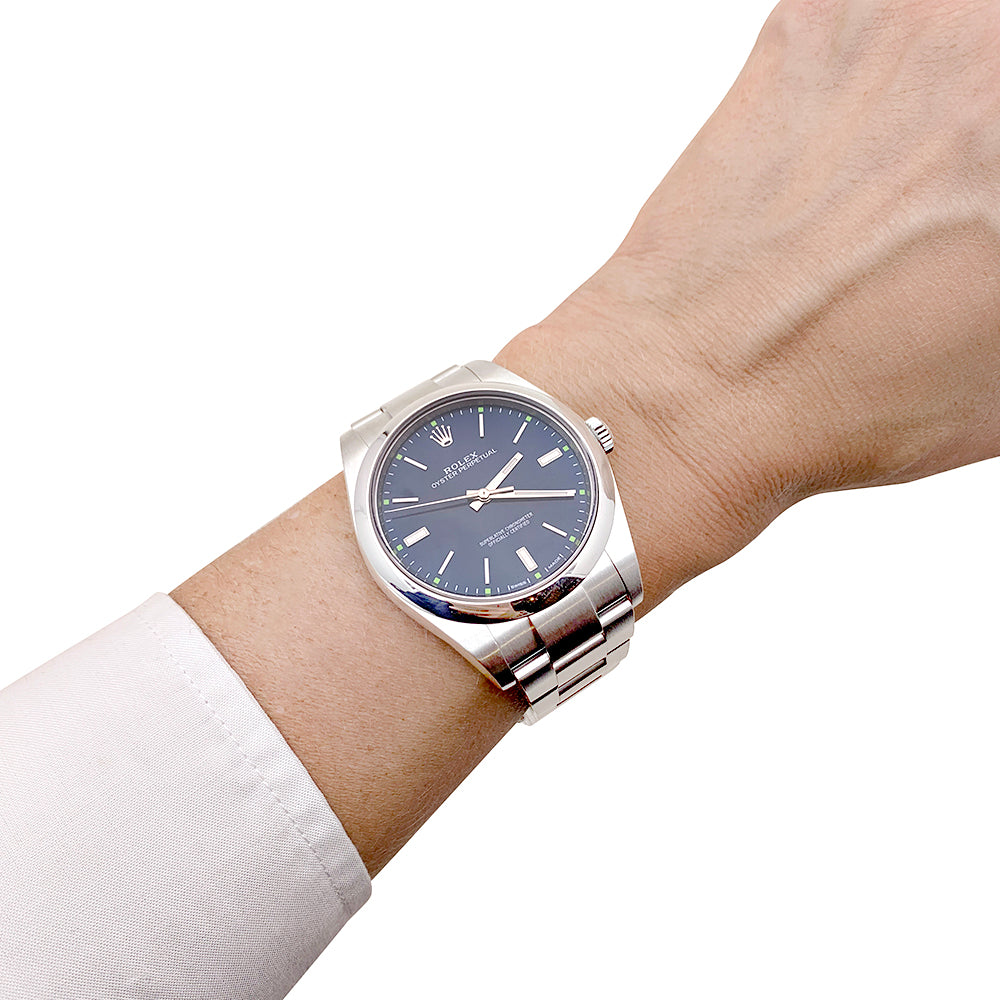 Rolex "Oyster Perpetual" steel watch.