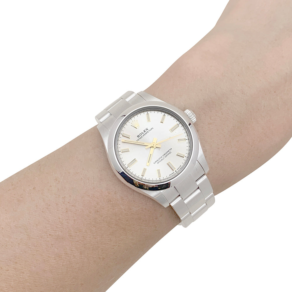 Rolex "Oyster Perpetual" steel watch.