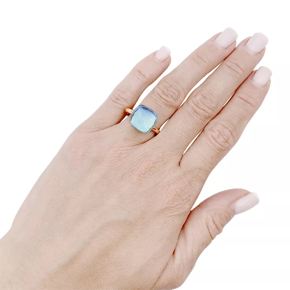 Pomellato ring, "Nudo Maxi", two golds and blue topaz.