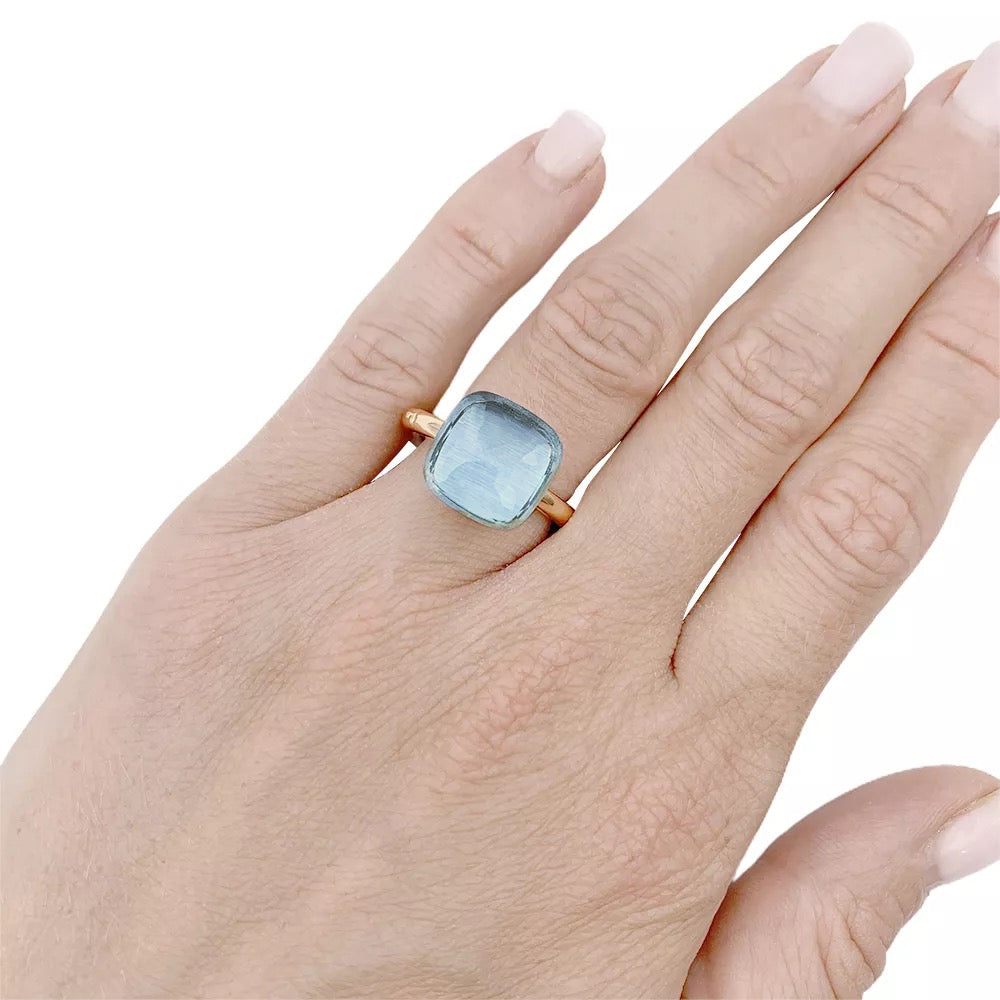 Pomellato ring, "Nudo Maxi", two golds and blue topaz.