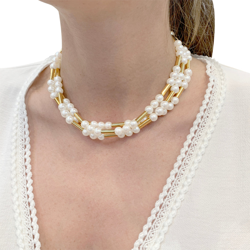 Poiray necklace, "Roseau" model, yellow gold, pearls.