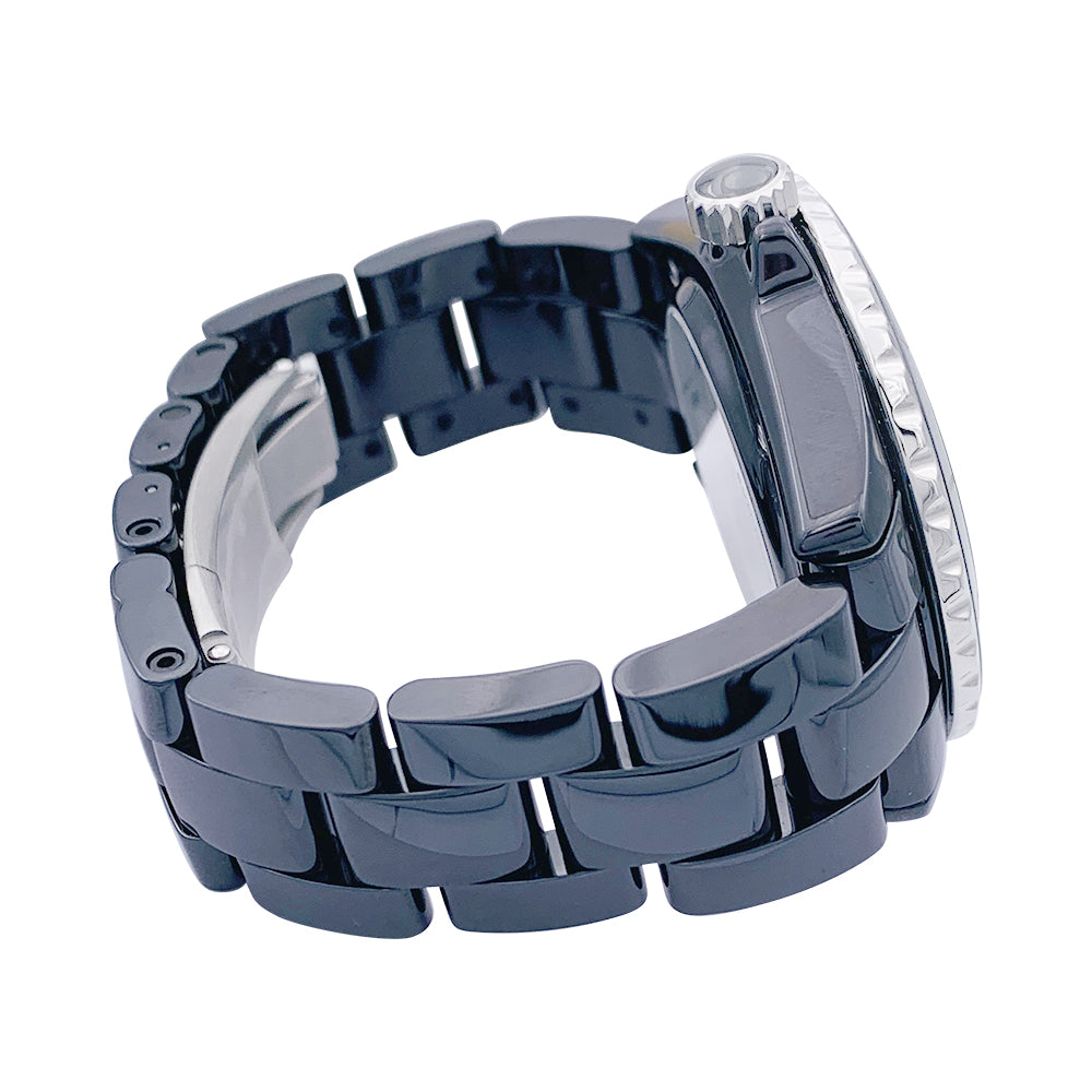 Chanel J12 black ceramic watch with diamonds.
