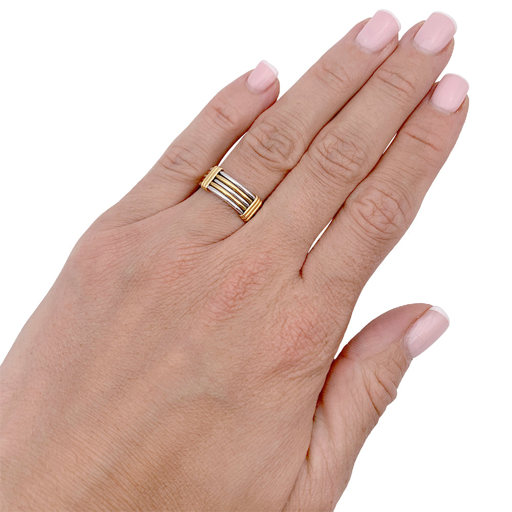 Bague Cartier or jaune et acier.