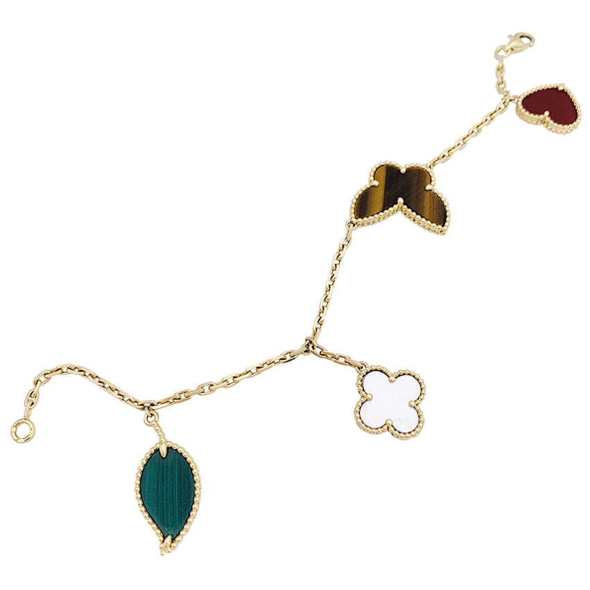 Van Cleef &amp; Arpels "Lucky Alhambra" bracelet in yellow gold with colored stones.