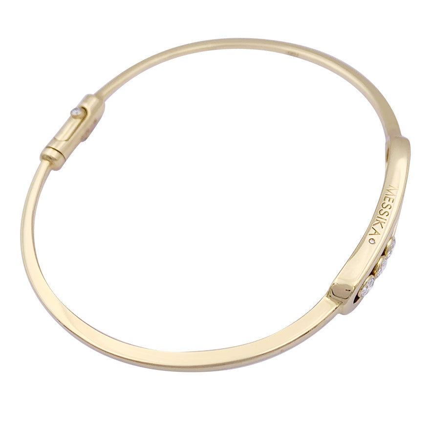 Messika bracelet, “Jonc Move”, yellow gold, diamonds.