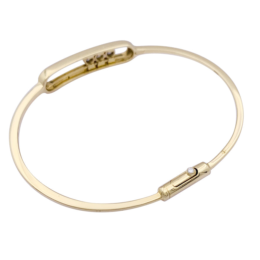 Messika bracelet, “Jonc Move”, yellow gold, diamonds.