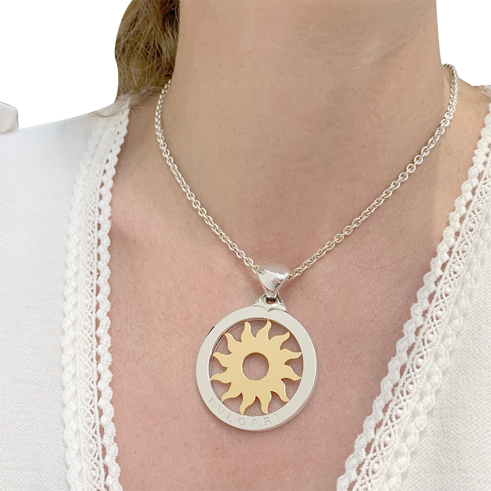 Bulgari necklace, "Tondo Sun", two golds, steel.