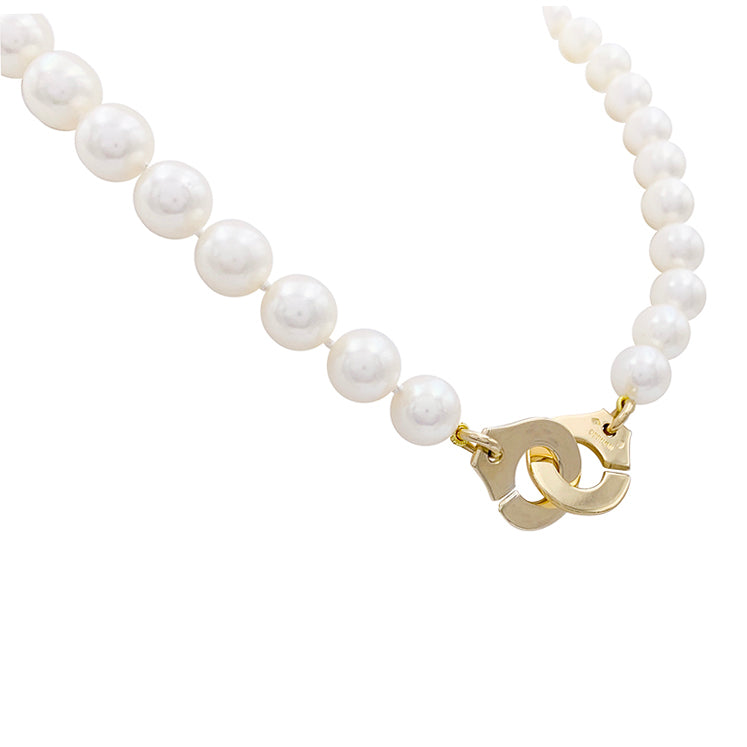 Dinh Van pearl necklace, "Menottes R15", in yellow gold.