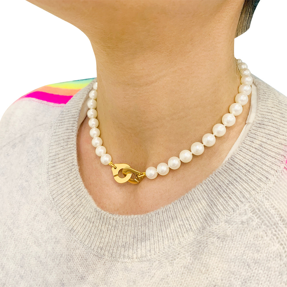 Dinh Van pearl necklace, "Menottes R15", in yellow gold.