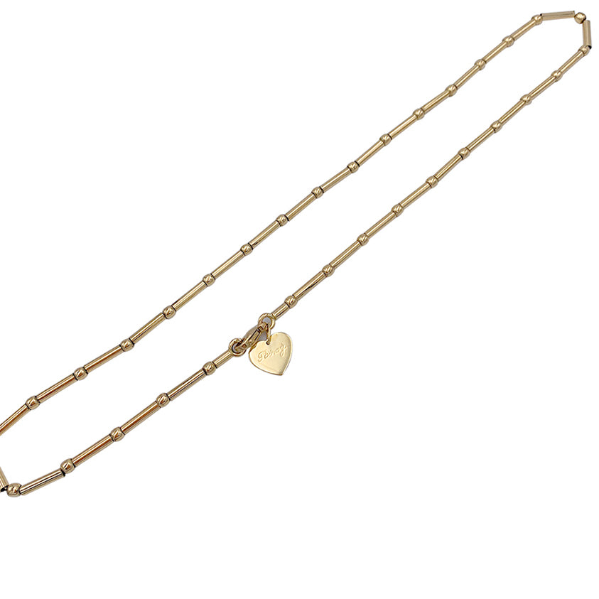 Poiray yellow gold chain.
