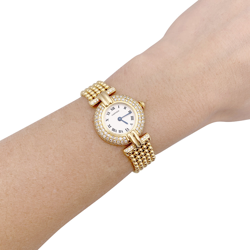 Cartier "Colisée" watch, yellow gold and diamonds.