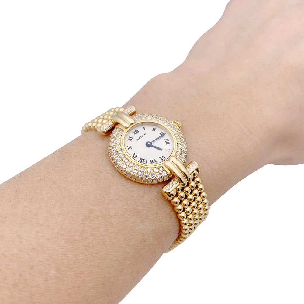 Cartier "Colisée" watch, yellow gold and diamonds.
