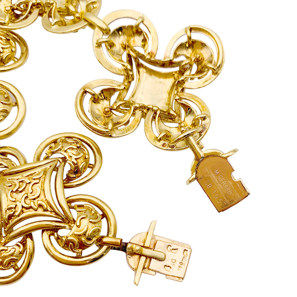 M. Gérard set in yellow gold, colored stones.