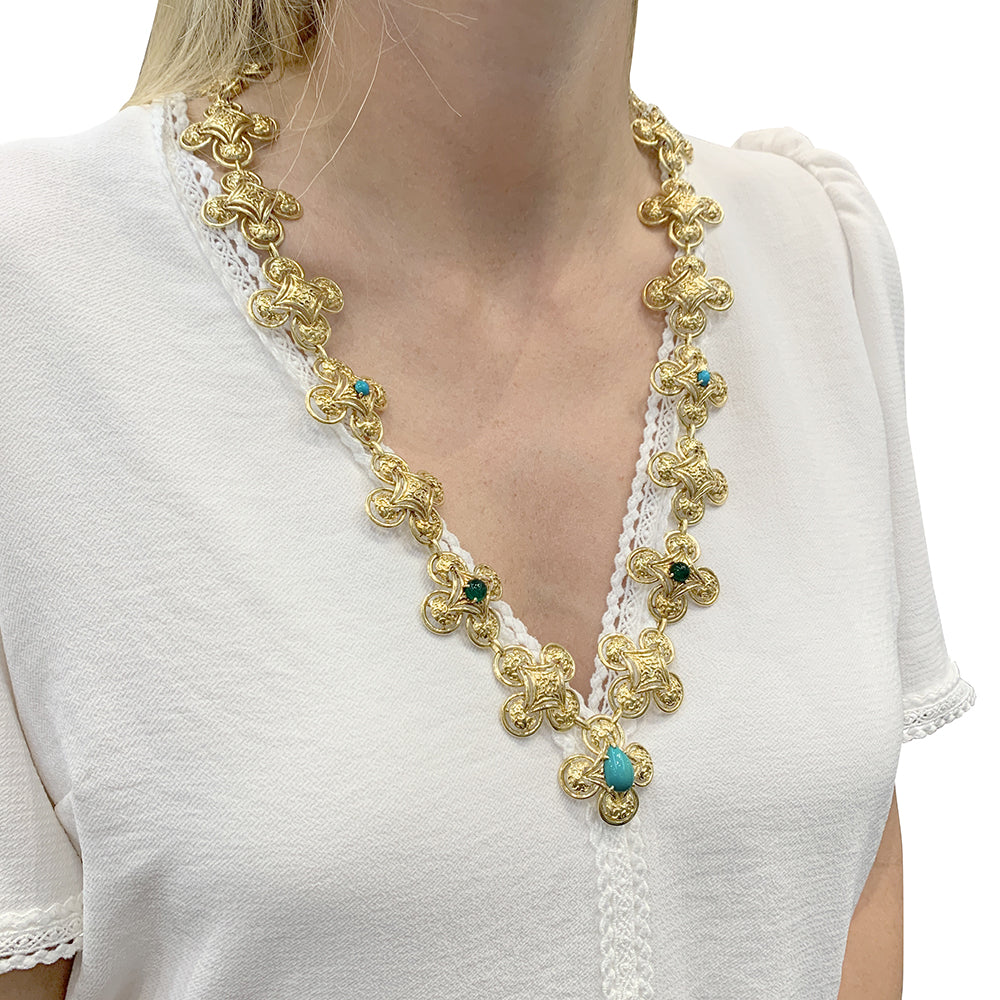 M. Gérard set in yellow gold, colored stones.