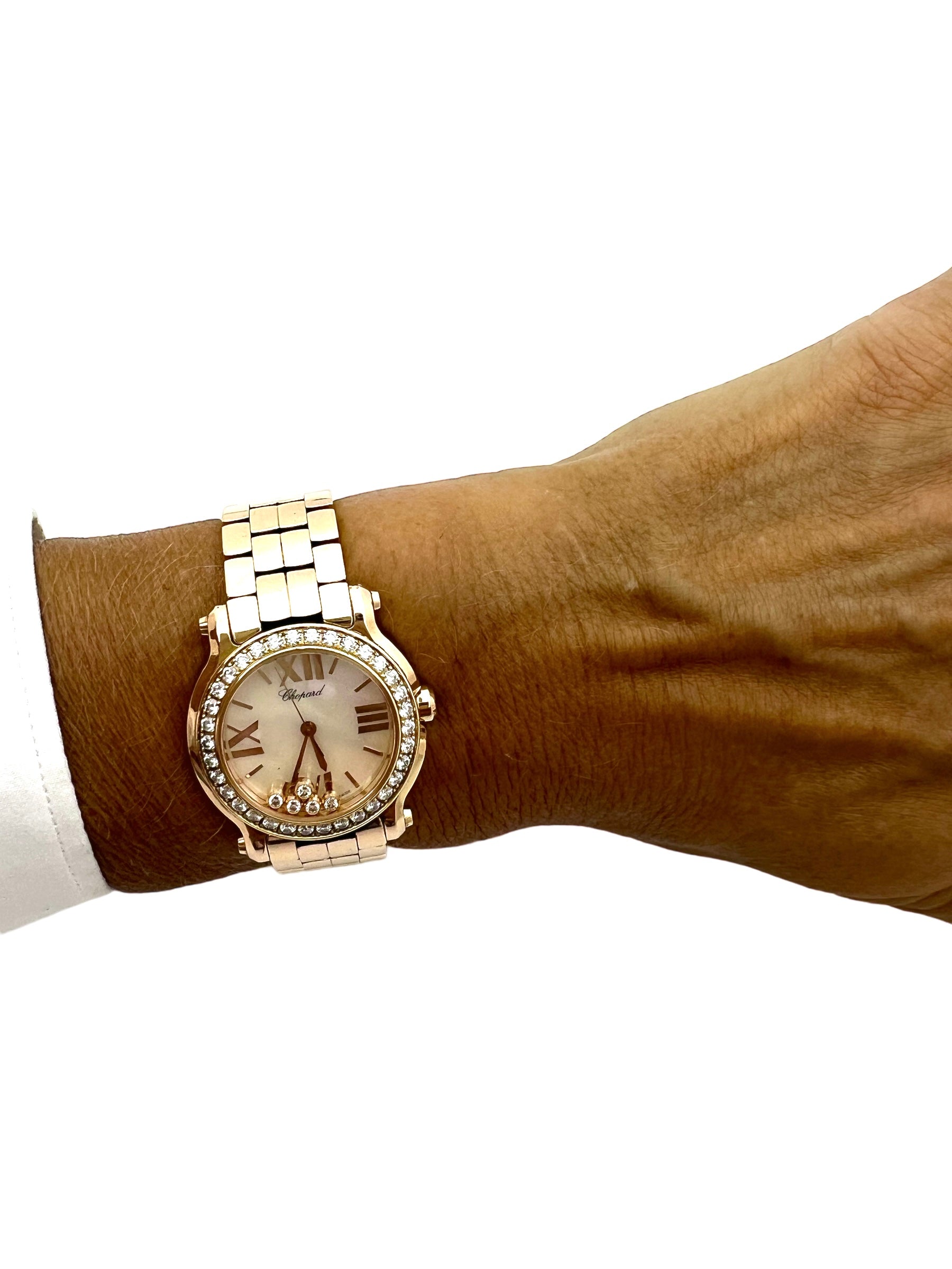 Chopard "Happy Sport" watch in rose gold and diamonds.