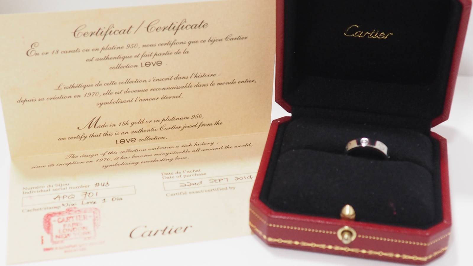 Bague Cartier Love or gris un diamant