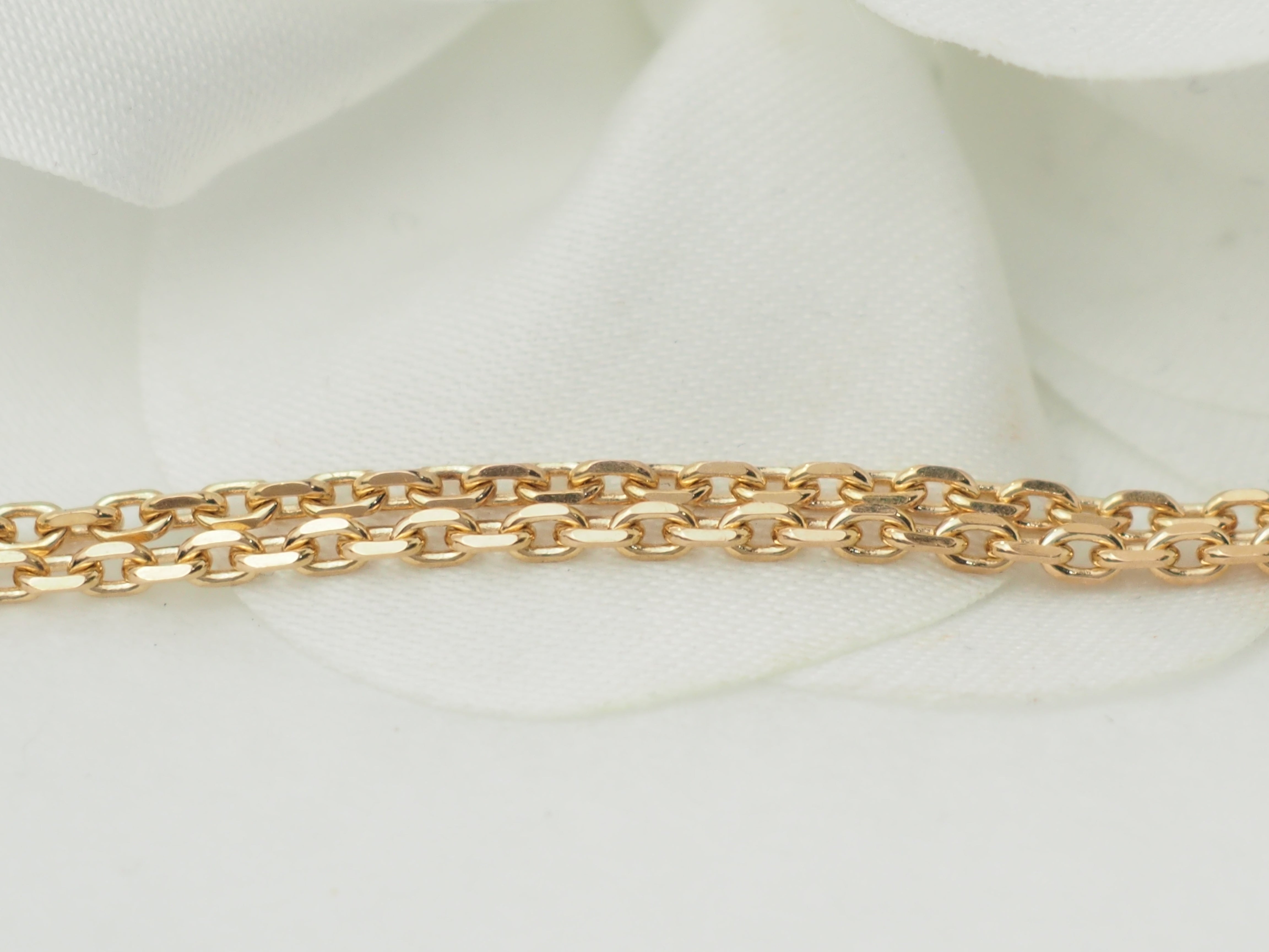 Collier pendentif en or jaune, émeraude et diamants