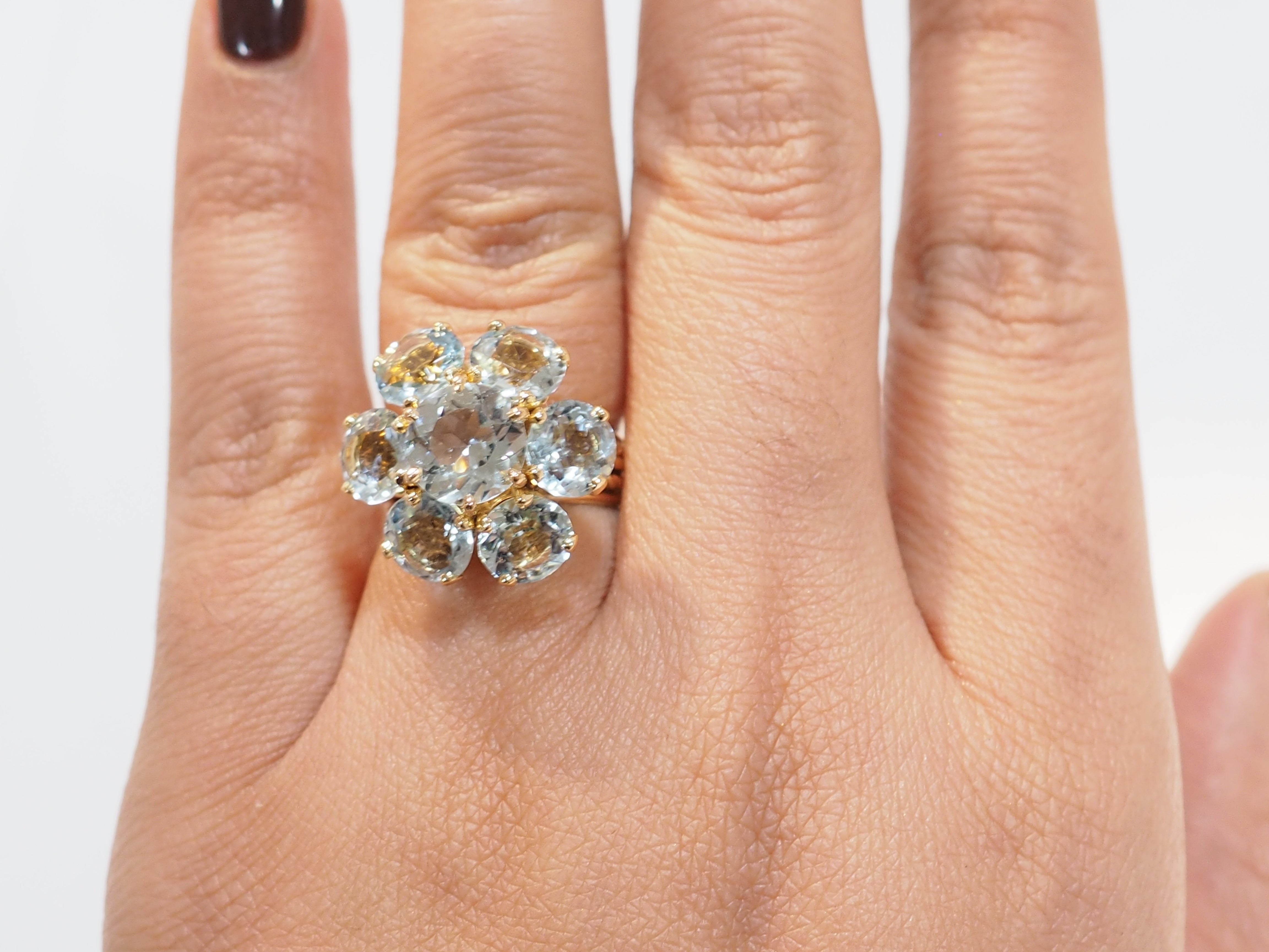 Bague fleur en or jaune et aigues marines