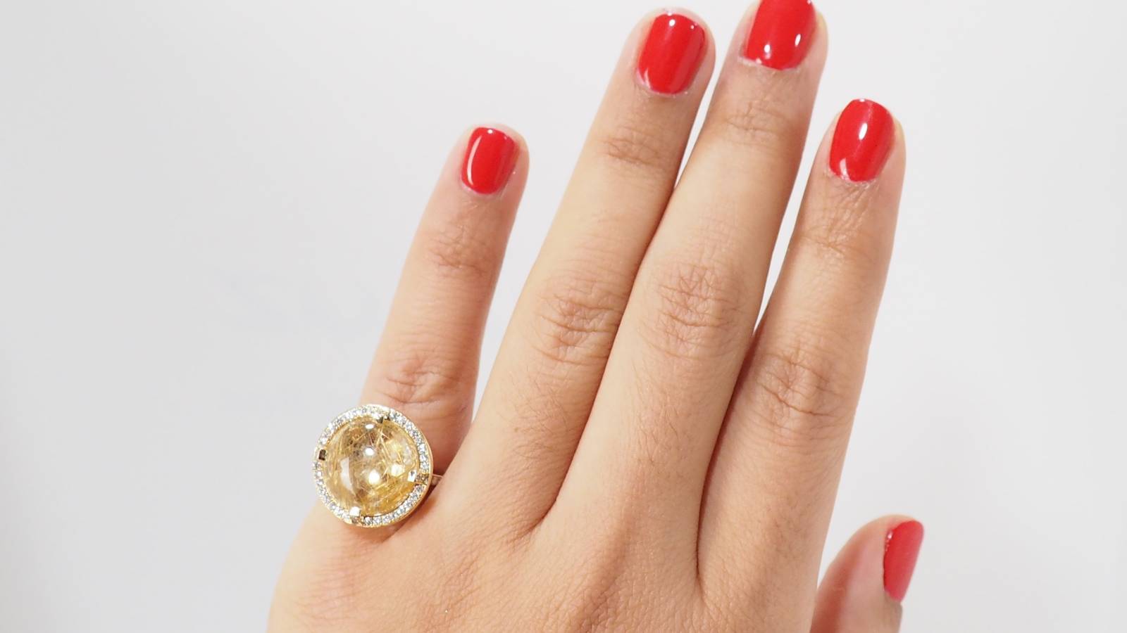 Chaumet ring in yellow gold, rutilated quartz and diamonds