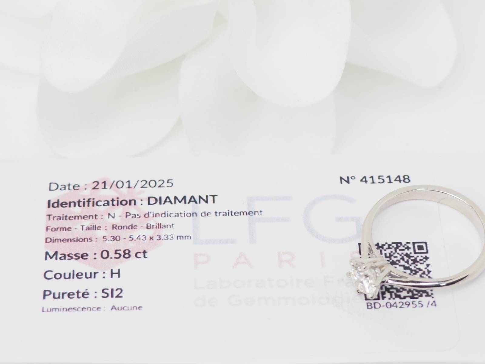 Bague solitaire en or blanc et diamant 0.58ct