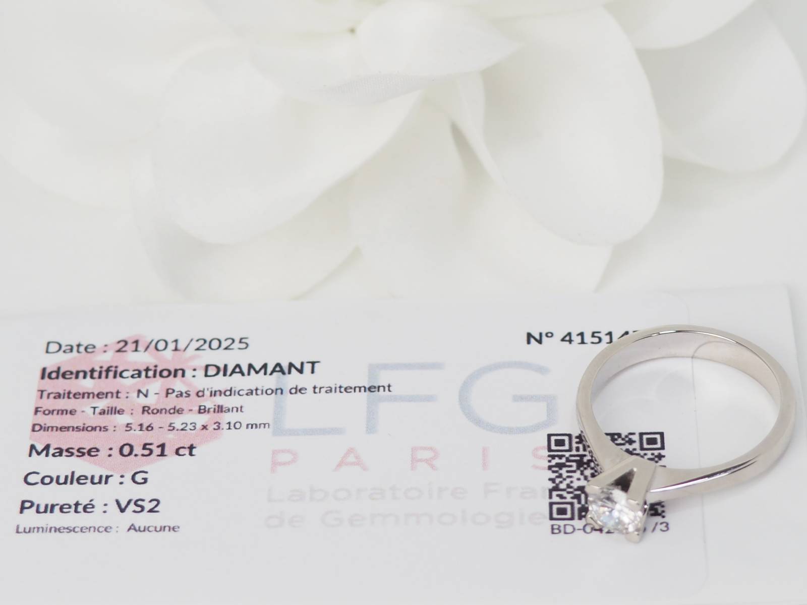 Bague solitaire en or blanc et diamant 0.51ct