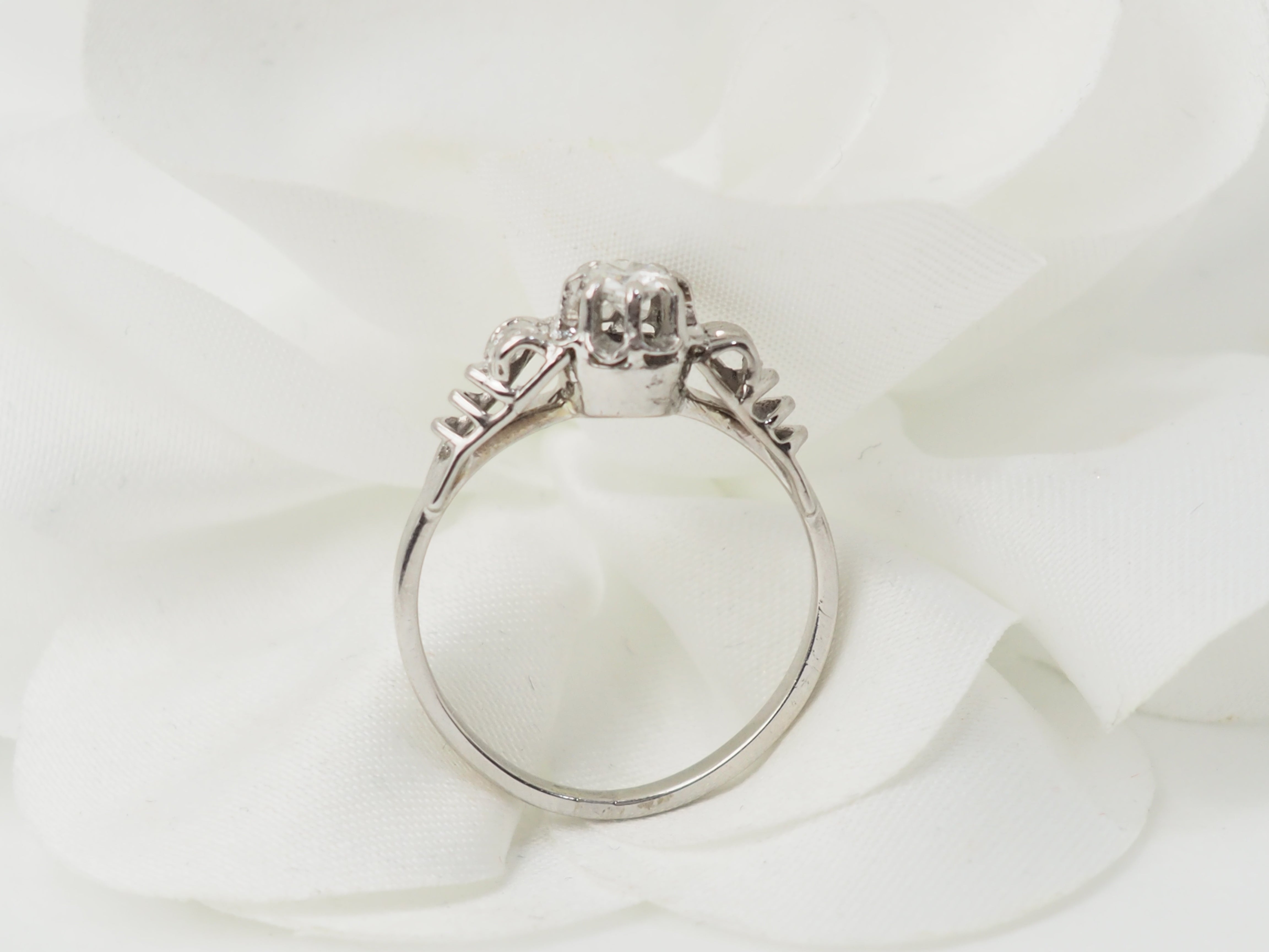 Bague solitaire en or blanc et platine, diamant 0,23ct