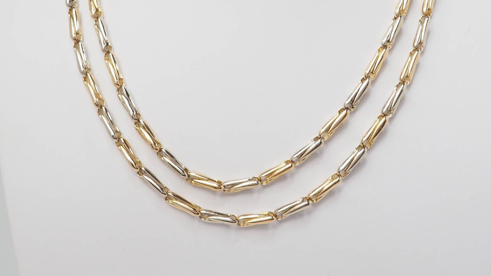 Collier Sautoir Cartier vintage en or jaune maille grain d'avoine