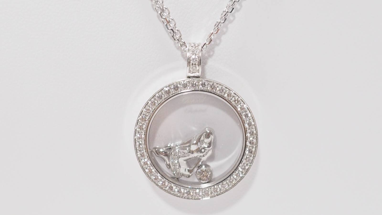 Collier Chopard "happy Diamonds" en or blanc et diamants