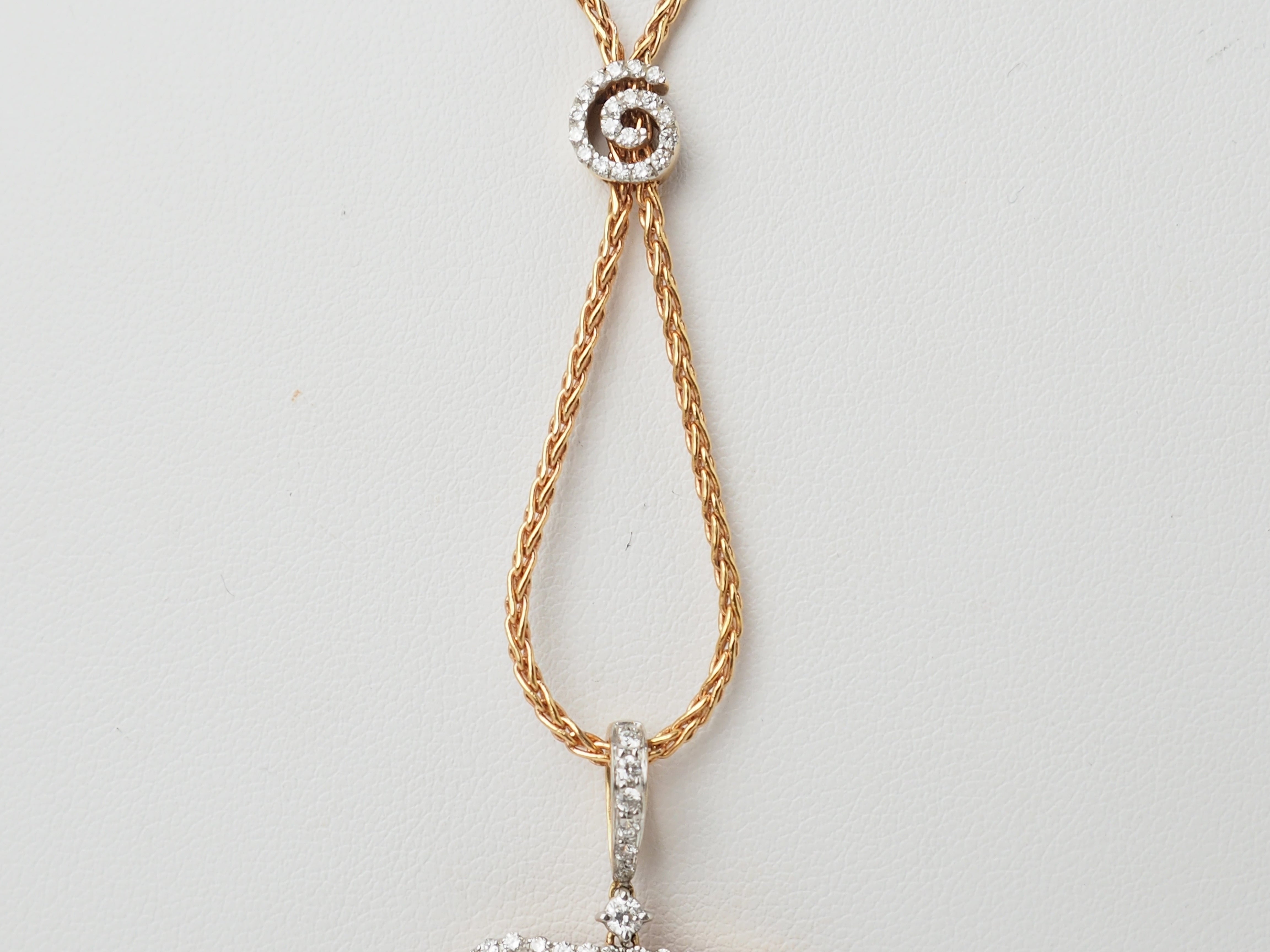 Collier pendentif fleur en or rose, pierres fines et diamants