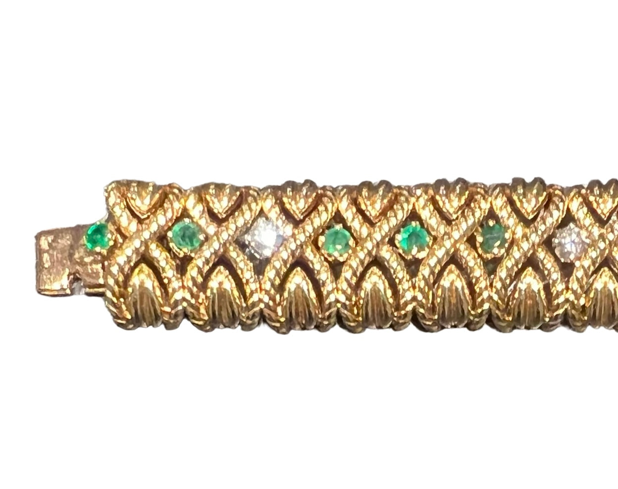A Van Cleef &amp; Arpels “X” bracelet in yellow gold, emeralds and diamonds
