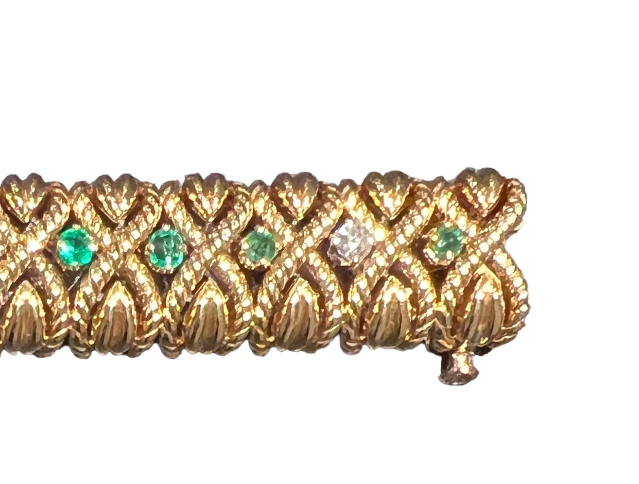A Van Cleef &amp; Arpels “X” bracelet in yellow gold, emeralds and diamonds