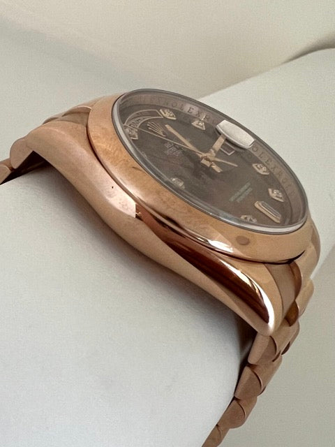 A Rolex Day Date rose gold watch with Tahitian mother-of-pearl dial