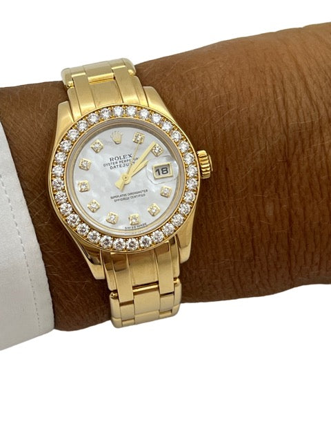 A Rolex Pearl Master watch in yellow gold and diamonds