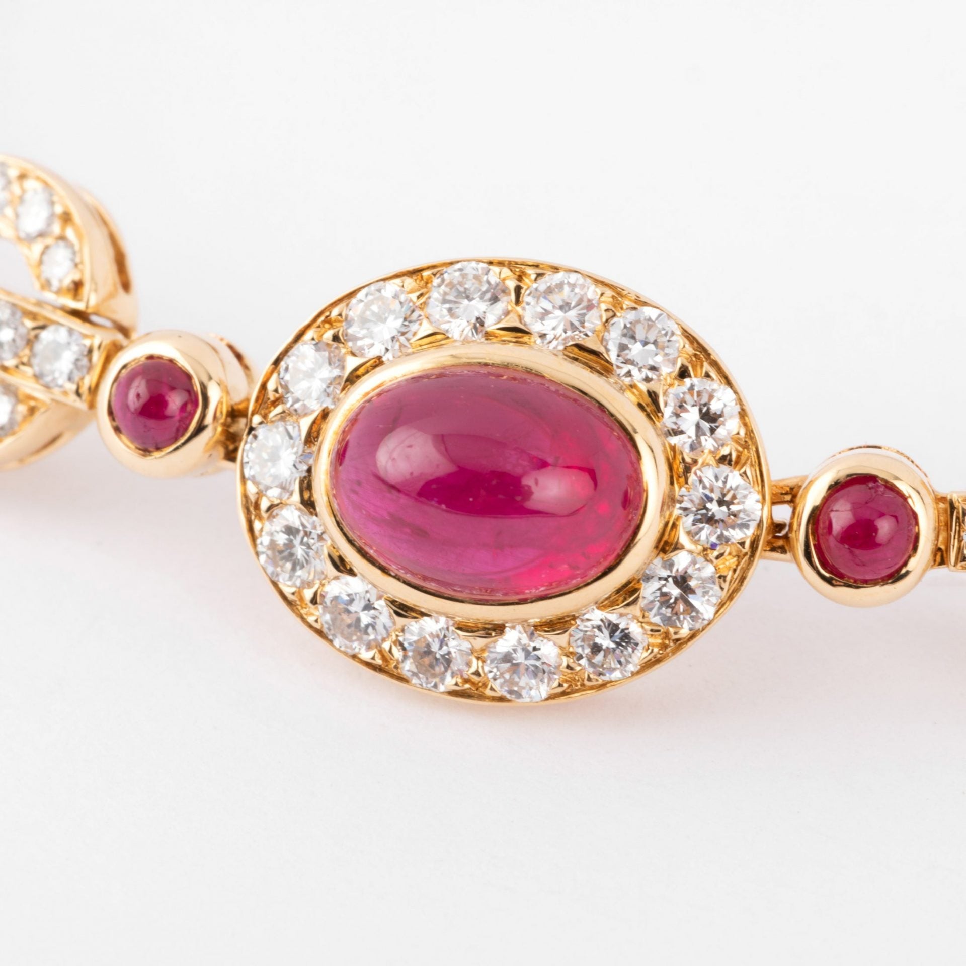 Bracelet in yellow gold and diamond, cabochon ruby from the house of Van Cleef and Arpels