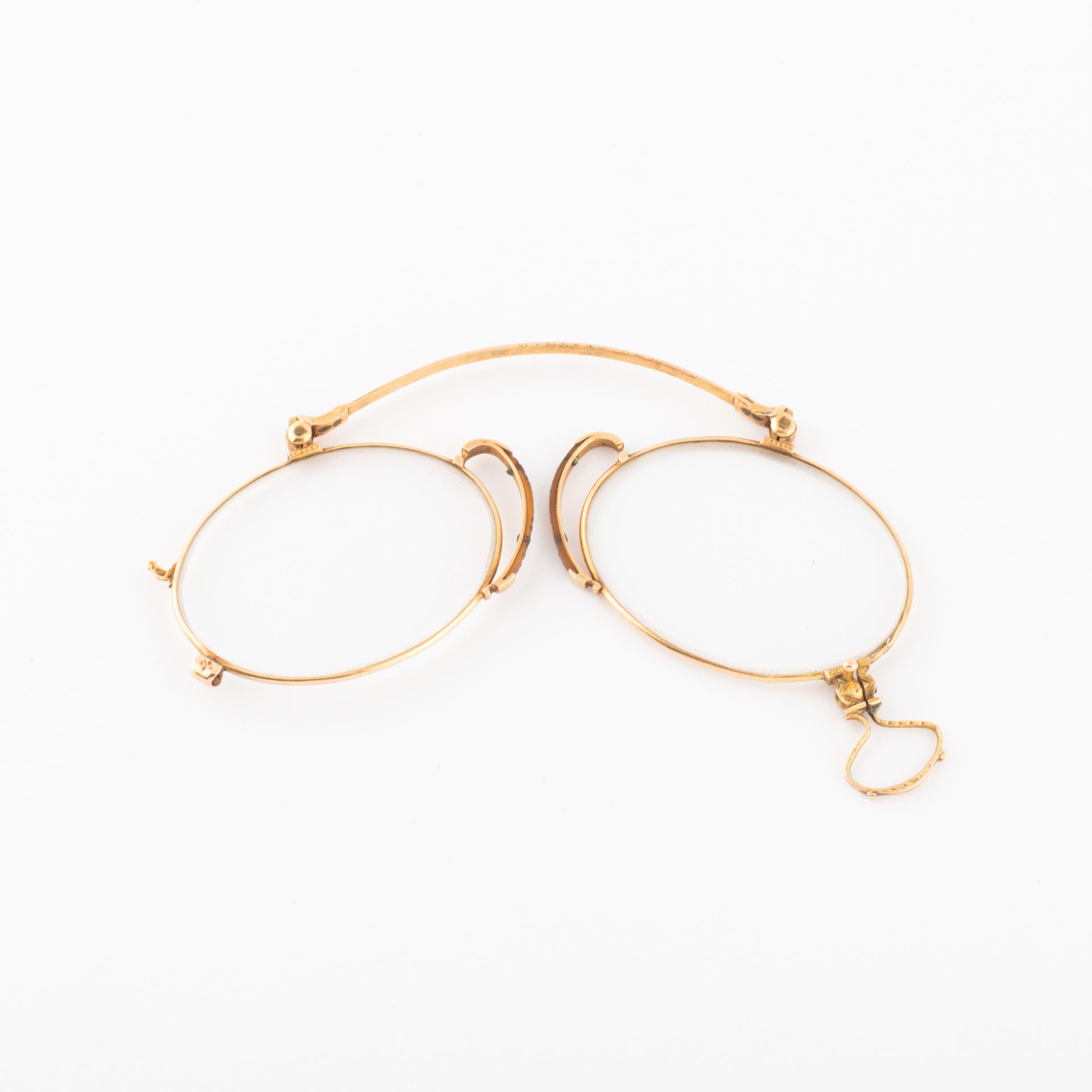 Gold eyeglasses dated circa 1900.