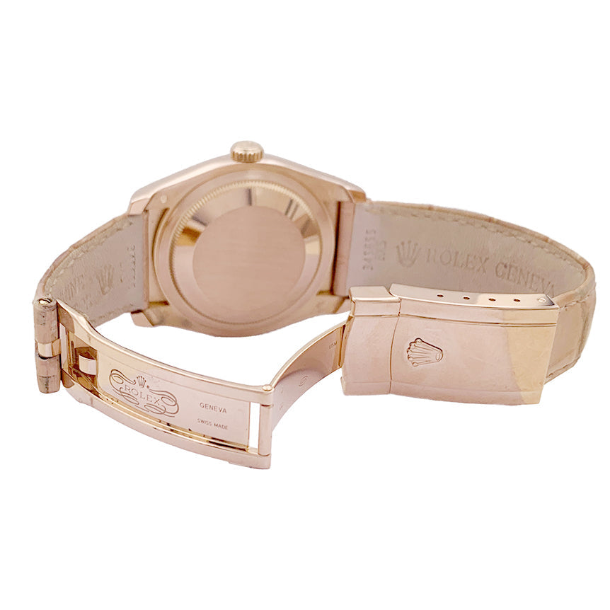 Montre Rolex, "Datejust" or rose, diamants, cuir.