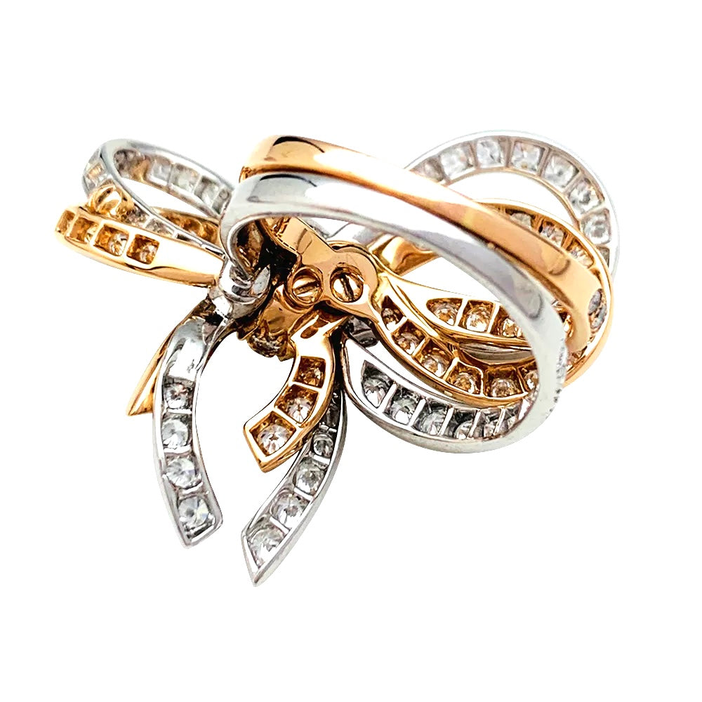 Van Cleef &amp; Arpels ring, "Double Knot", white gold, pink gold, diamonds.