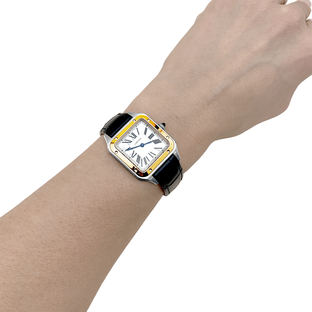 Montre Cartier, "Santos-Dumont", or, acier, cuir.
