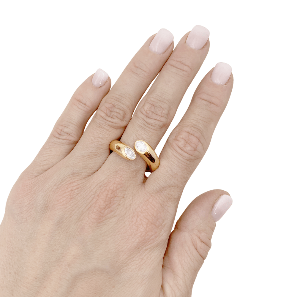 Bague Cartier, "Ellipse Deux Têtes Croisées", or jaune, diamants.