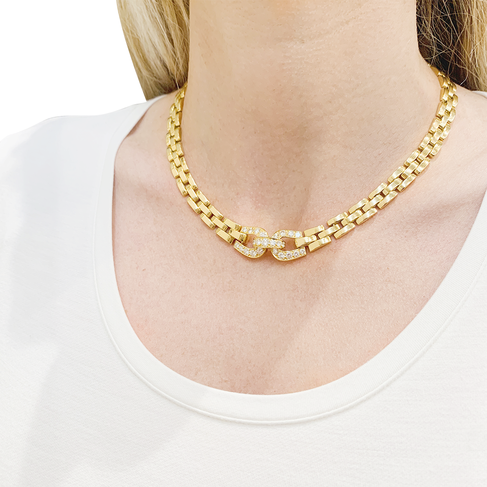 Collier Cartier, "Etrier", or jaune, diamants.