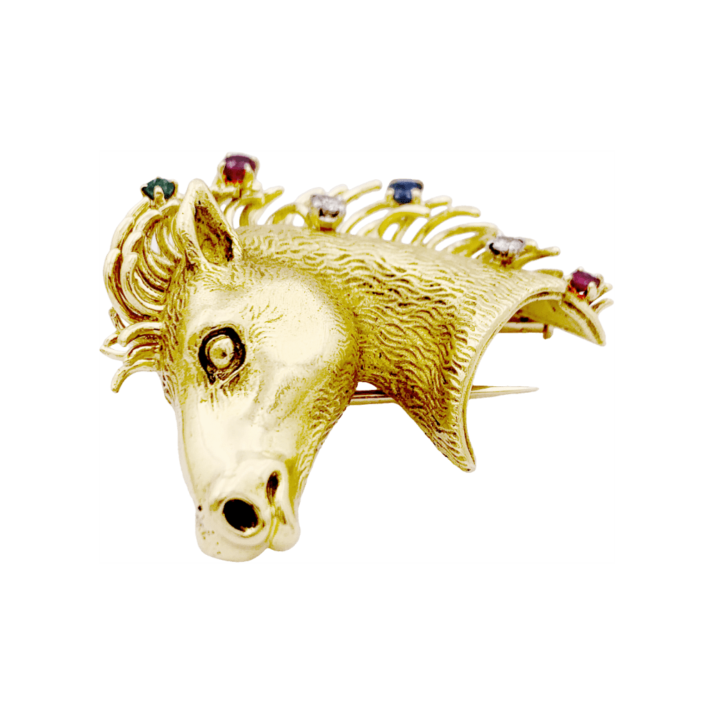 Broche "protomée de cheval", or jaune, diamants, rubis, saphir et émeraude.