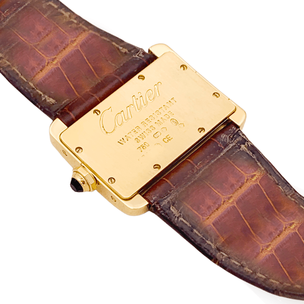 Montre Cartier, "Divan", or jaune, cuir.