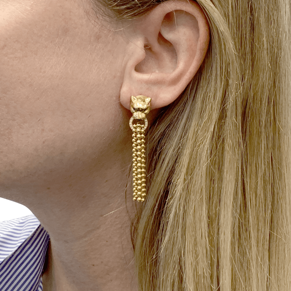 Boucles d'oreilles CARTIER, "Panthère de Cartier", or jaune, diamants, tsavorites et onyx.