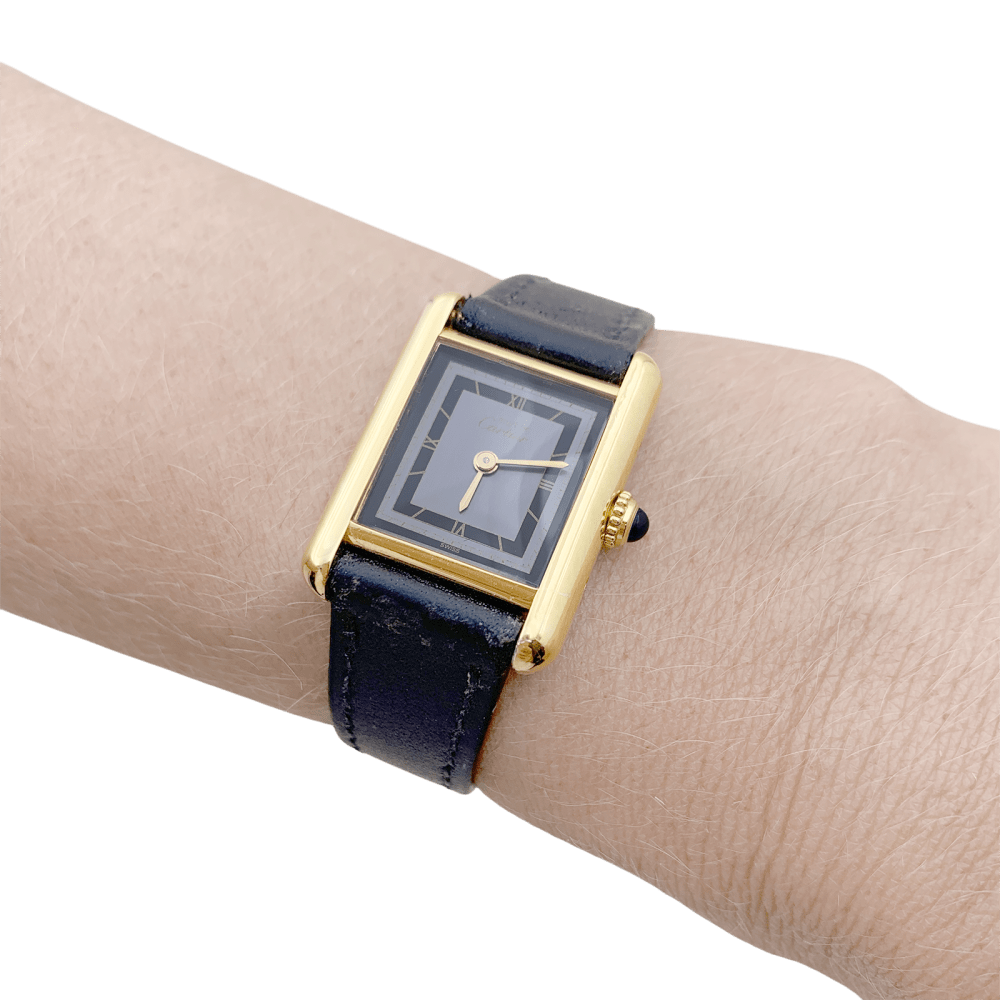 Montre Cartier, "Tank Must", argent plaqué or, cuir.