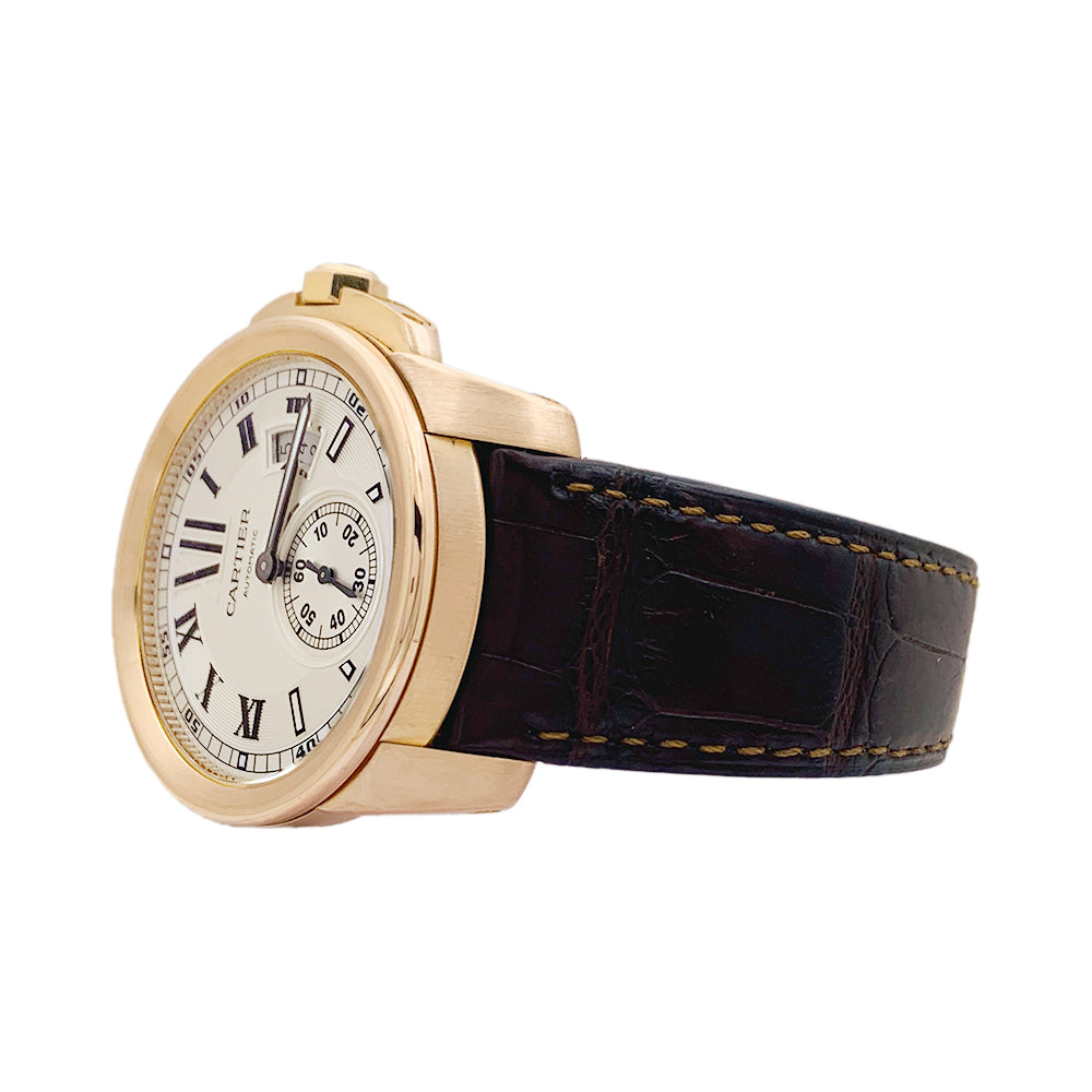 Montre Cartier, "Calibre de Cartier", or rose, cuir.