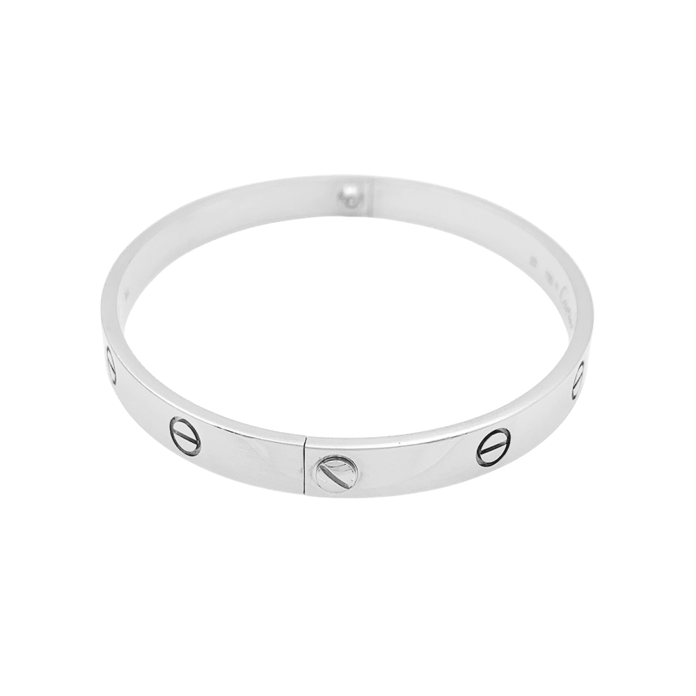 Bracelet Cartier, "Love", or blanc.