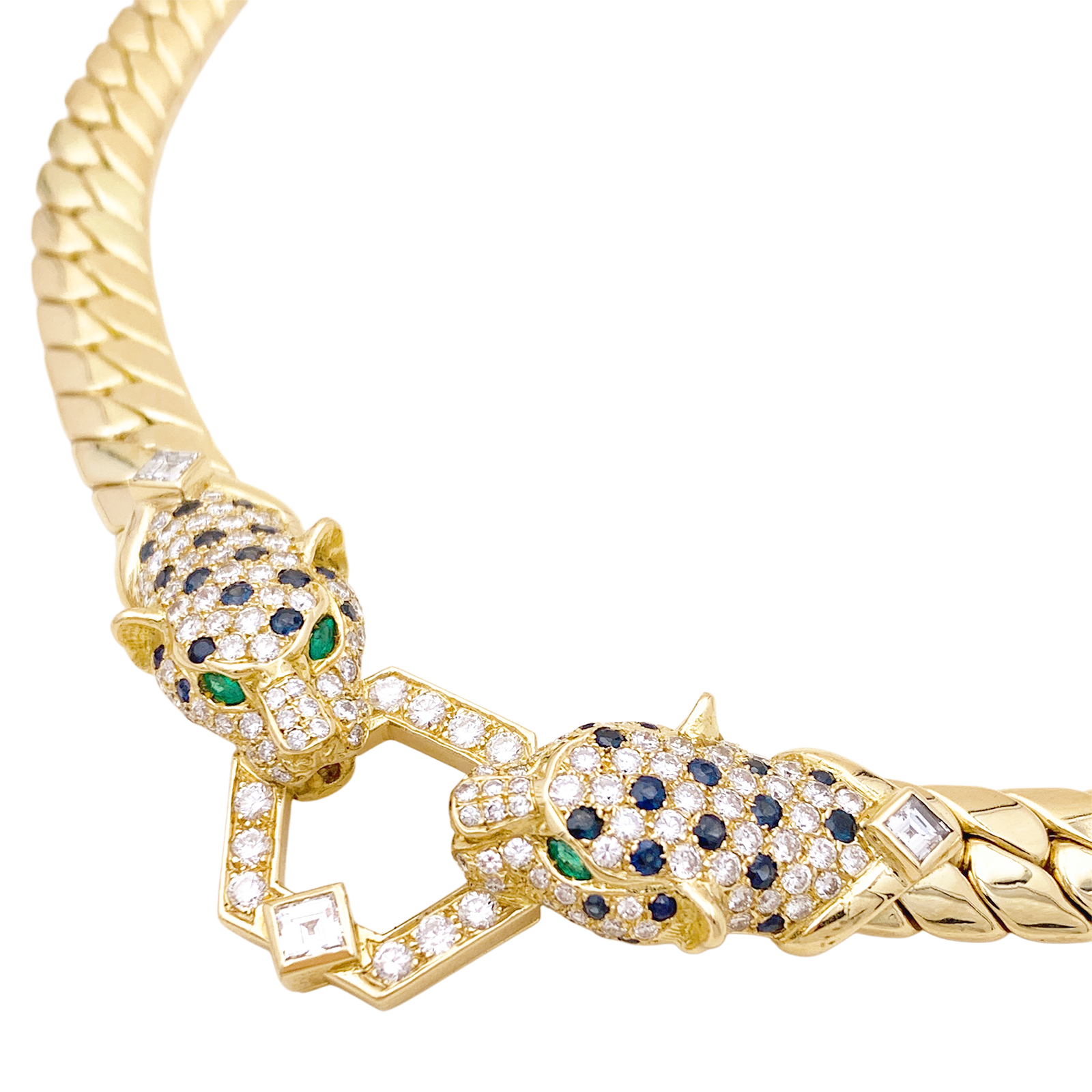 Collier O.J. PERRIN, or jaune, diamants, saphirs et émeraudes.
