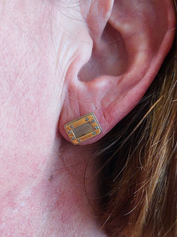 Cartier "Santos Dumont" earrings in yellow gold and steel