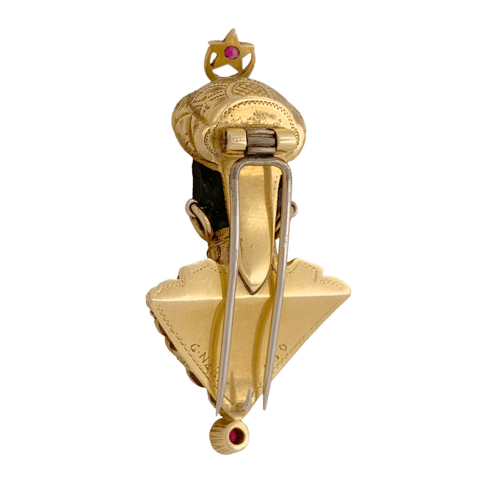 Broche G.NARDI, "Moretto", or jaune, rubis, ébène.