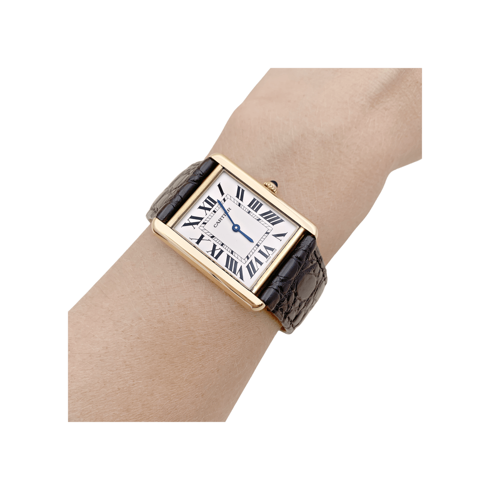 Montre Cartier, "Tank Solo", or jaune et acier.